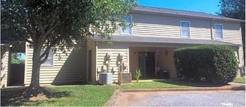 Hickory apartment for rent - A house with a tree in front of it.