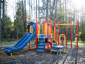 Covington apartment for rent - a playground with slides and a picnic table
