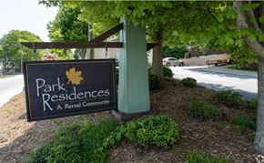 Hendersonville apartment for rent - a park residents sign in front of a building
