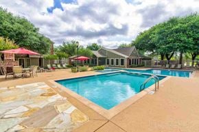 Fort Worth apartment for rent - Two swimming pools with sundeck and outdoor seating areas at Highland Park Apartments, Texas, 76132