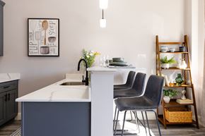 Manchester apartment for rent - A kitchen with a white counter and a sink.