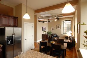 Coventry apartment for rent - a kitchen and dining room with a table and a refrigerator