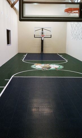 Clinton apartment for rent - a basketball court in a gym with a basketball hoop in the background