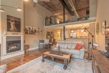 Coventry apartment for rent - a living room with a couch and a coffee table and a fireplace