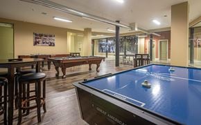 Lawrence apartment for rent - a games room with a pool table and a billiard table