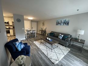 Concord apartment for rent - a living room with a couch and a table
