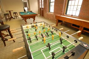 Worcester apartment for rent - a game room with a foosball table and a pool table