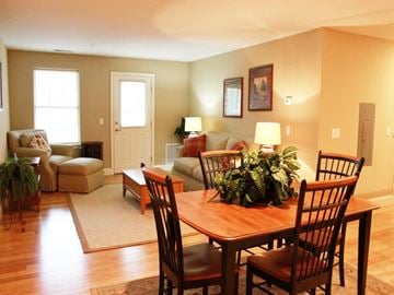 Laconia apartment for rent - a living room and dining room with a table and chairs