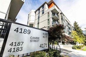Vancouver condo for rent - A street sign for Cambie Street is shown in front of a building.