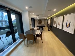 Vancouver condo for rent - A conference room with a table and chairs.
