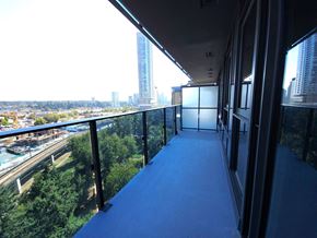 Surrey condo for rent - a balcony with a view of a city