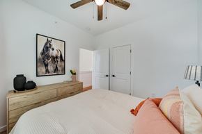 Marble Falls apartment for rent - bedroom with queen size bed and ample natural lighting