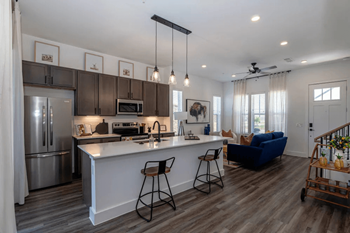 Open floor plans flooded with natural light