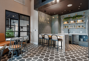 Round Rock apartment for rent - A modern kitchen with a dining table and chairs.