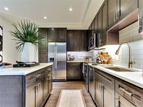 Dallas apartment for rent - Double sided refrigerators and wine-fridges in select floor plans.
