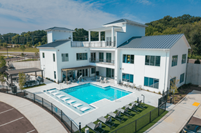 Antioch apartment for rent - A large white house with a pool in the backyard.