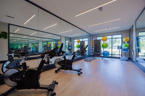 Chester apartment for rent - A gym with stationary bikes and a mirrored wall.