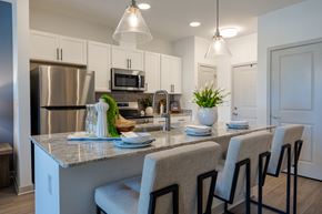 Chester apartment for rent - A kitchen with a counter and chairs.