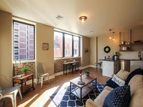 Harrisburg apartment for rent - a living room with a couch and a table