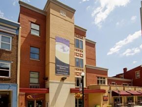 Harrisburg apartment for rent - a building with a banner on the side of it