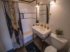 Harrisburg apartment for rent - a bathroom with a sink and a shower and a toilet