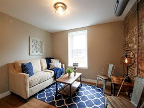 Harrisburg apartment for rent - a living room with a couch and a table