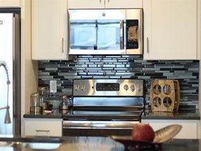 Harrisburg apartment for rent - a kitchen with a stove and a microwave