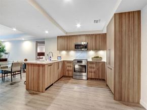 Los Angeles apartment for rent - a kitchen with wooden cabinets and a counter top