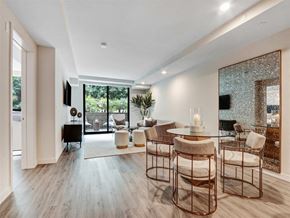 Los Angeles apartment for rent - a living room with a table and chairs and a couch