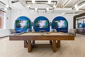Edmonton townhouse for rent - A pool table with a blue screen behind it.