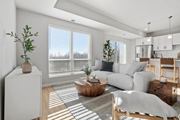 Waconia apartment for rent - a living room with a couch and a coffee table    and a kitchen