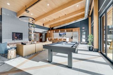 Shoreview apartment for rent - a pool table in the center of a living room