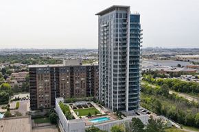 Brampton apartment for rent - Exterior of building with outdoor pool and courtyard at 188 Cityview in Brampton, ON