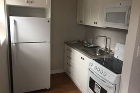 Toronto apartment for rent - 641 Vaughan Road in Toronto, ON kitchen with fridge, stove and microwave