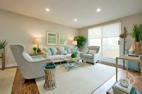 Acton apartment for rent - Acton Apartments living room with hardwood flooring and access to balcony in Acton, ON