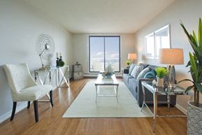 Fort Erie apartment for rent - Albany Place spacious living room with access to balcony in Fort Erie, ON