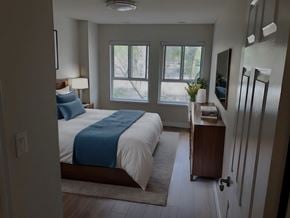Toronto apartment for rent - A bedroom with a bed, nightstand, and a window at Angus House in Toronto