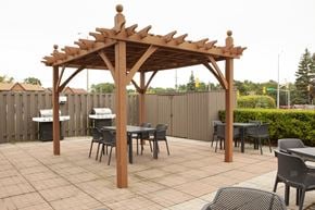 Barrie apartment for rent - Highpoint Barrie outdoor patio with gazebo, seating and BBQs