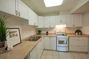 St. Catharines apartment for rent - Kitchen with dishwasher and stove at Hillcrest Terrace in St. Catharines, ON