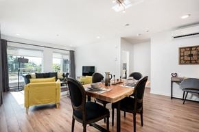 Brossard apartment for rent - Open concept layout with view into dining and living rooms at Le Saint-Laurent Apartments in Brossard