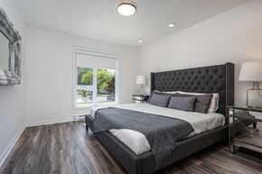 Brossard apartment for rent - Master bedroom of a two bedroom apartment with large windows at Le Saint-Laurent Apartments in Brossard