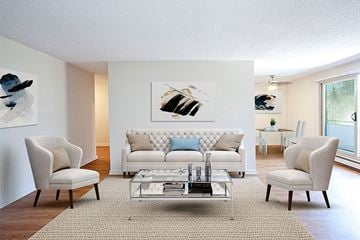 Owen Sound apartment for rent - a living room with a couch and chairs and a table