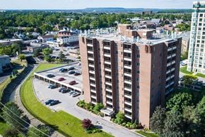 Milton apartment for rent - Millside Tower drone image of exterior of building in Milton, ON