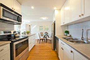 Milton apartment for rent - Millside Tower modern kitchen with stainless steel appliances in Milton, ON