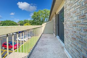 Belleville apartment for rent - A private balcony overlooking the parking lot at Moira Apartments in Belleville, ON
