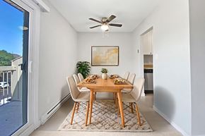 Belleville apartment for rent - A dining room with a table at Moira Apartments in Belleville, ON