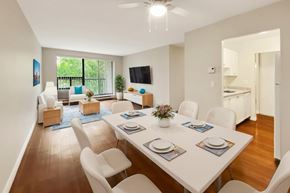 Kingston apartment for rent - A dining room with a white table and chairs.