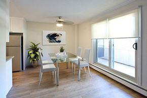 Owen Sound apartment for rent - Regency Towers spacious dining room with hard surface flooring and access to balcony in Owen Sound, ON