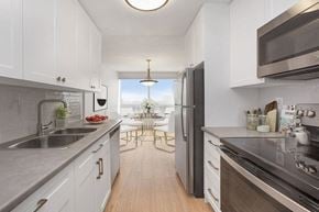 Chatham apartment for rent - Kitchen with premium cabinetry and stainless steel appliances at Riverbend Tower Apartments in Chatham, ON