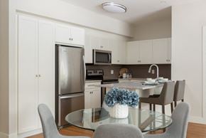 Kelowna apartment for rent - The Conservatory view of modern kitchen from dining area in Kelowna, BC